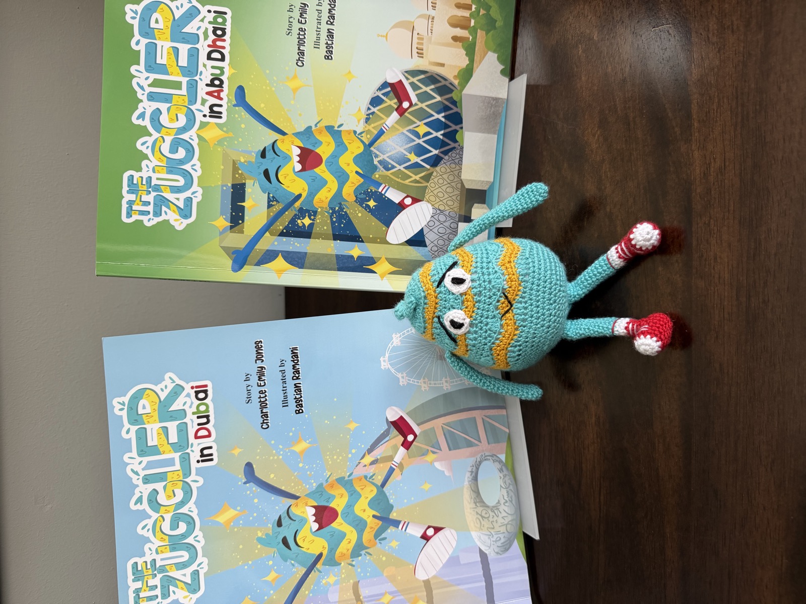 Both Zuggler books together with the hand-knitted Zuggler teddy